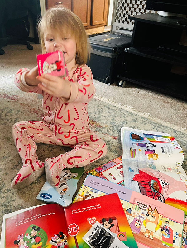 child reading board books